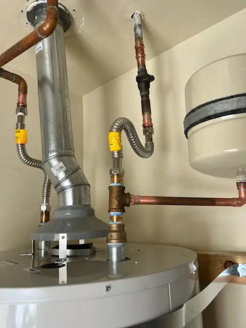 Water heater installation and plumbing repair in Dearmont Chase
